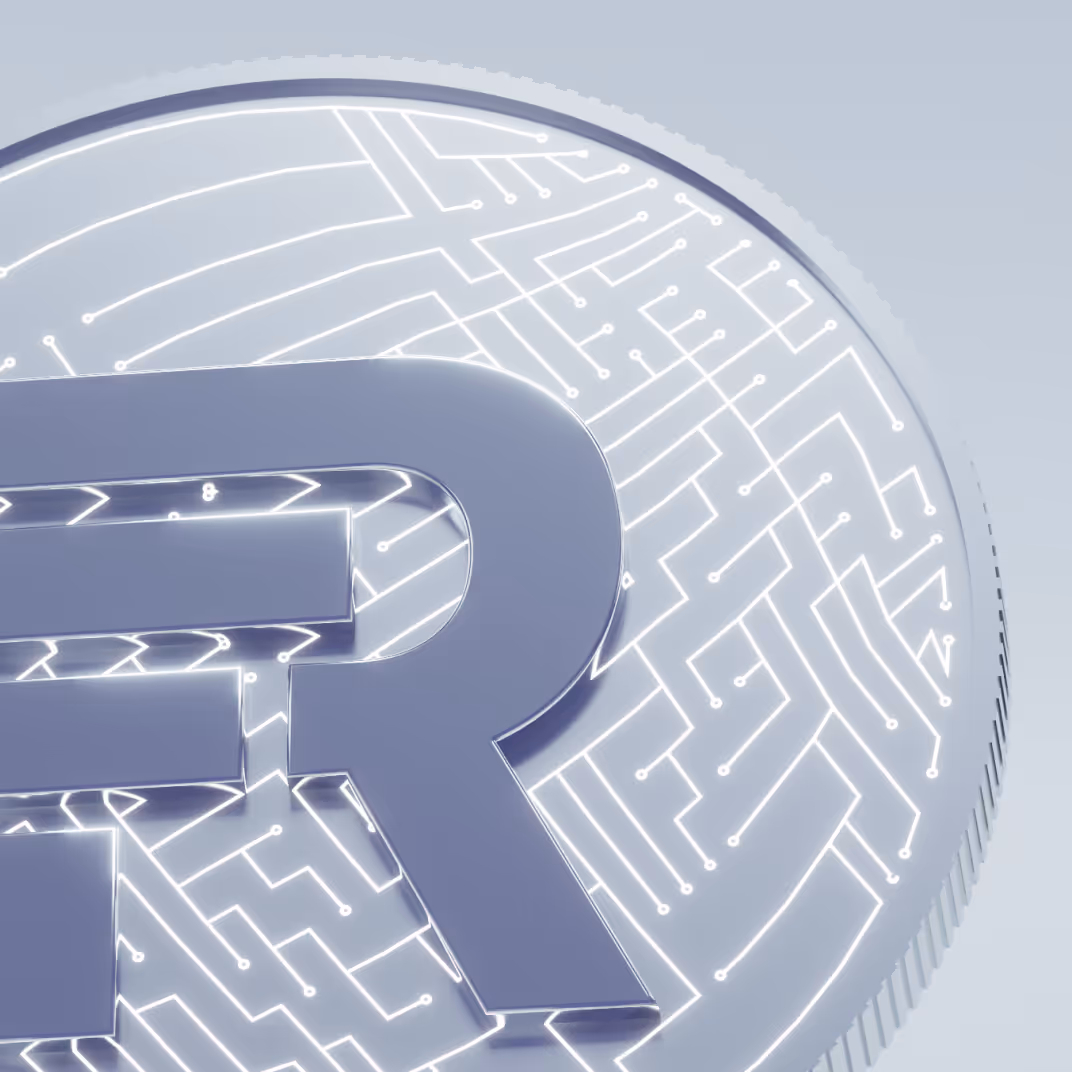 Close-up of a digital cryptocurrency coin with circuit board design and the letter G.