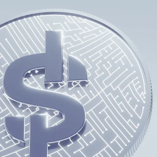 Close-up of a digital cryptocurrency coin with circuit board design and the letter G.