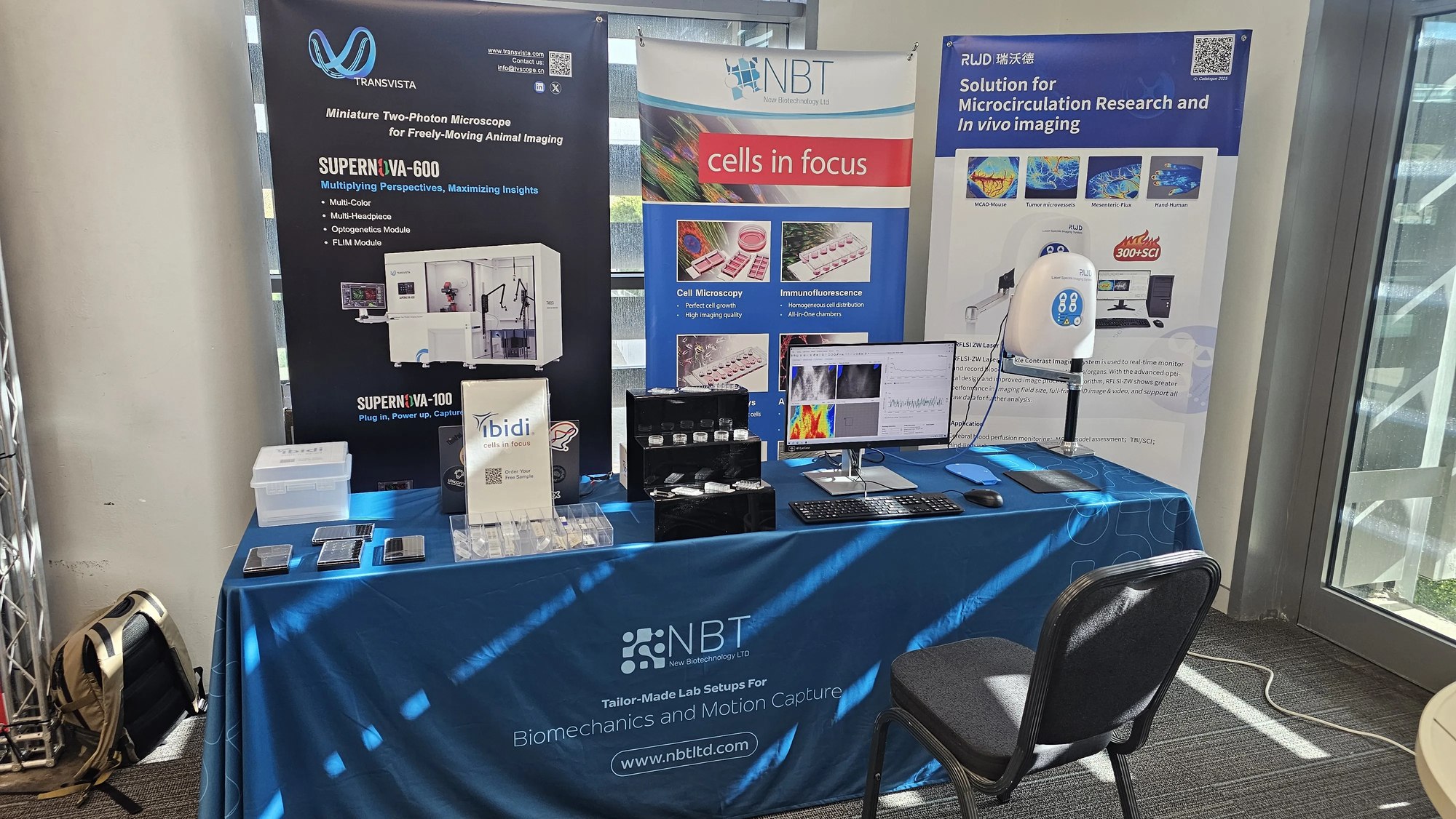 NBT booth at ISM 2026 with TransVista, ibidi, and RWD banners