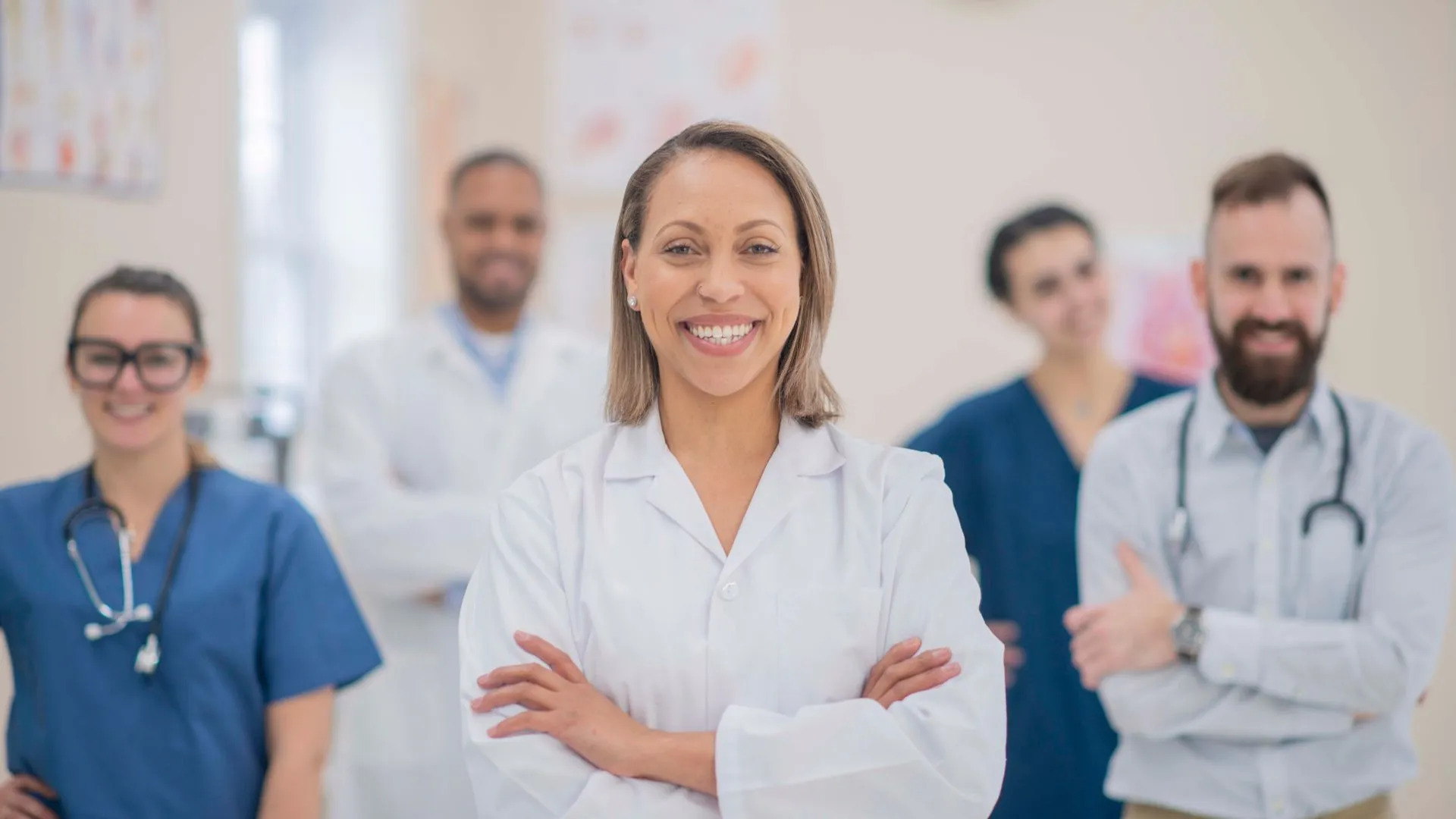 A group of doctors standing in a hospital.