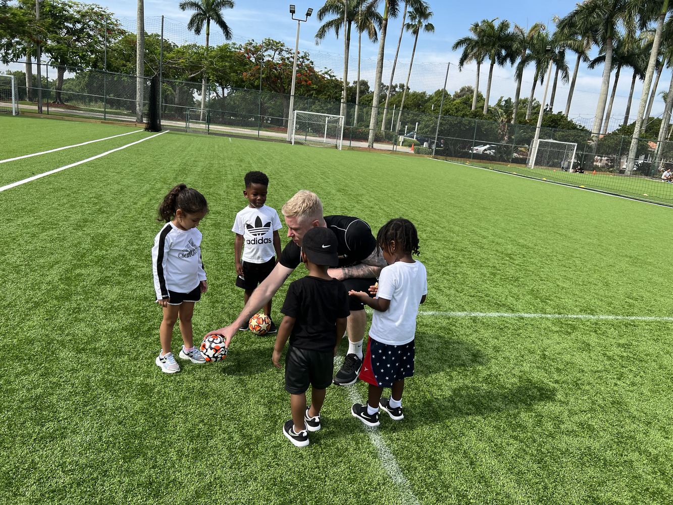 Early soccer training helping kids build coordination and confidence.