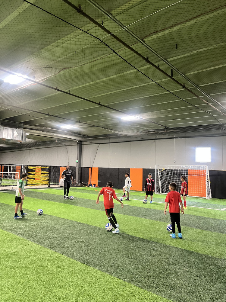 Kids connecting and building friendships through soccer.