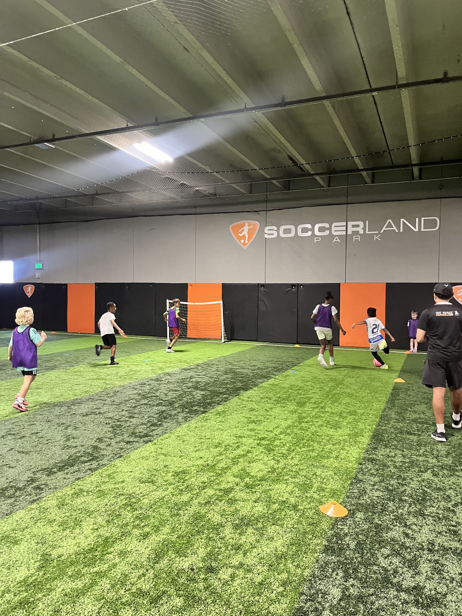 Active child-focused soccer session using a smaller field.