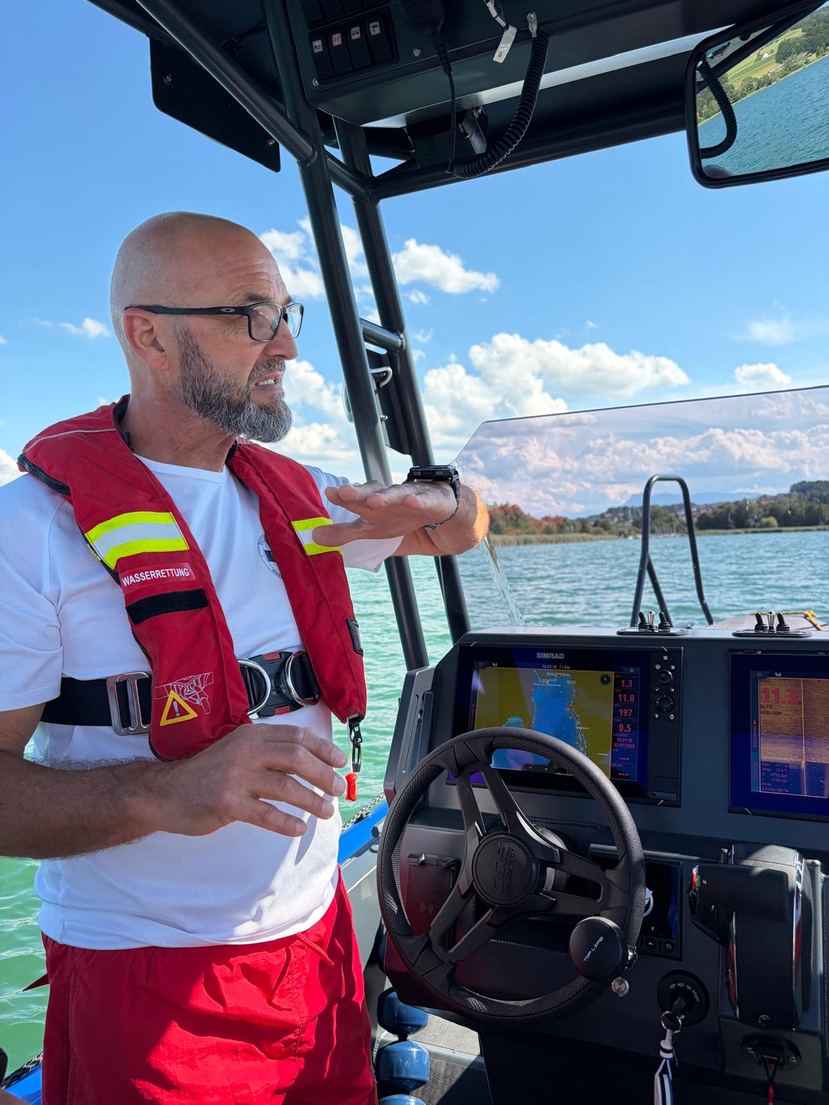 Wasserrettung Obertrum skipper at the helm of the S585 Pro rescue boat