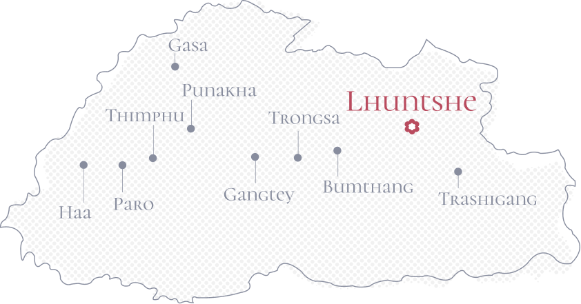 Illustrated map of Bhutan highlighting Lhuentse district in red, known for its traditional textile weaving and serene rural landscapes.