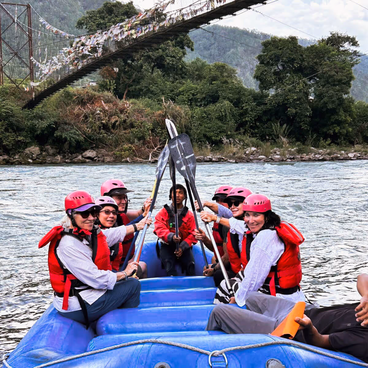 Guests rafting on the river in Punakha, Bhutan.