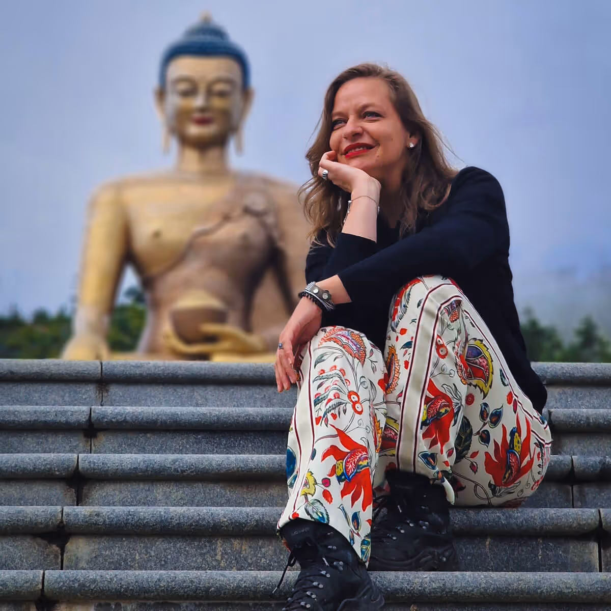 Guest sitting at Buddha Point steps, Thimphu.
