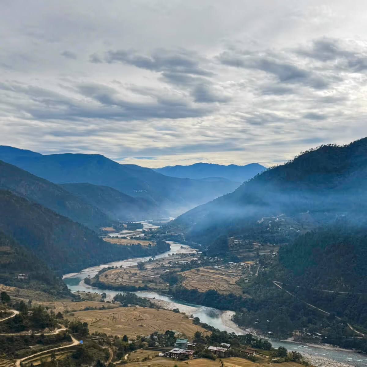 Serene Punakha valley view with river and terraced fields