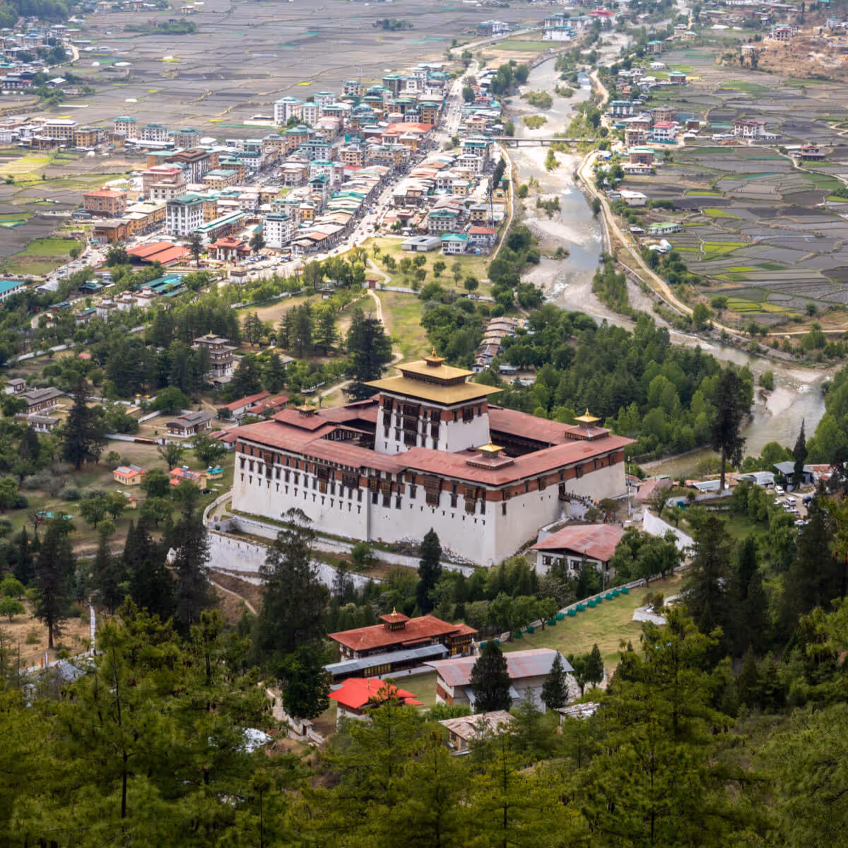 Aerial view of Paro Dzong and valley fields in Paro, Bhutan.
