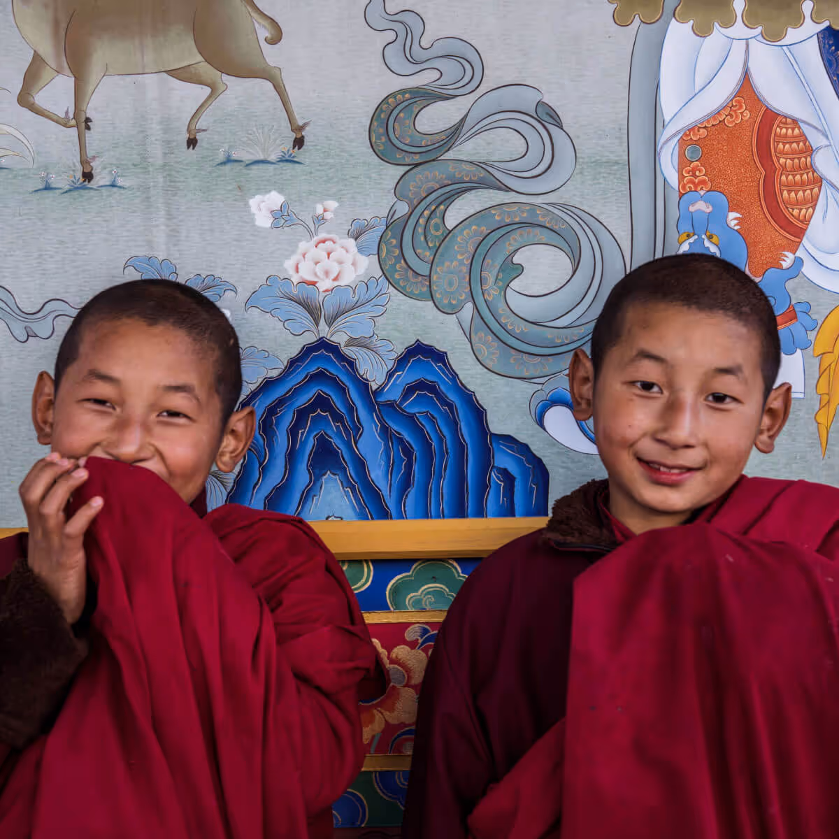 Smiling twin monks in Bhutan
