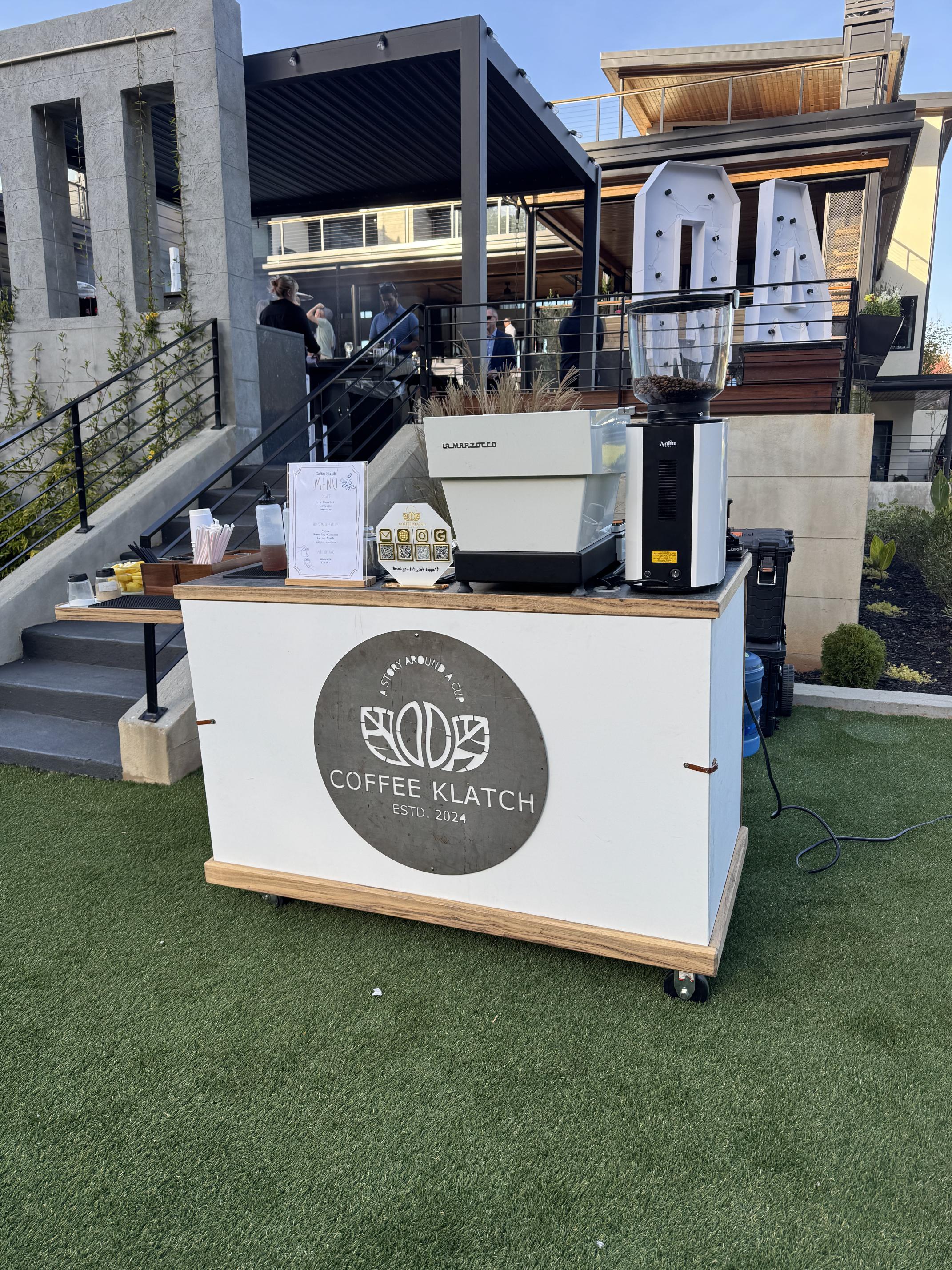 Coffee Klatch mobile espresso bar cart at a Greenville event.