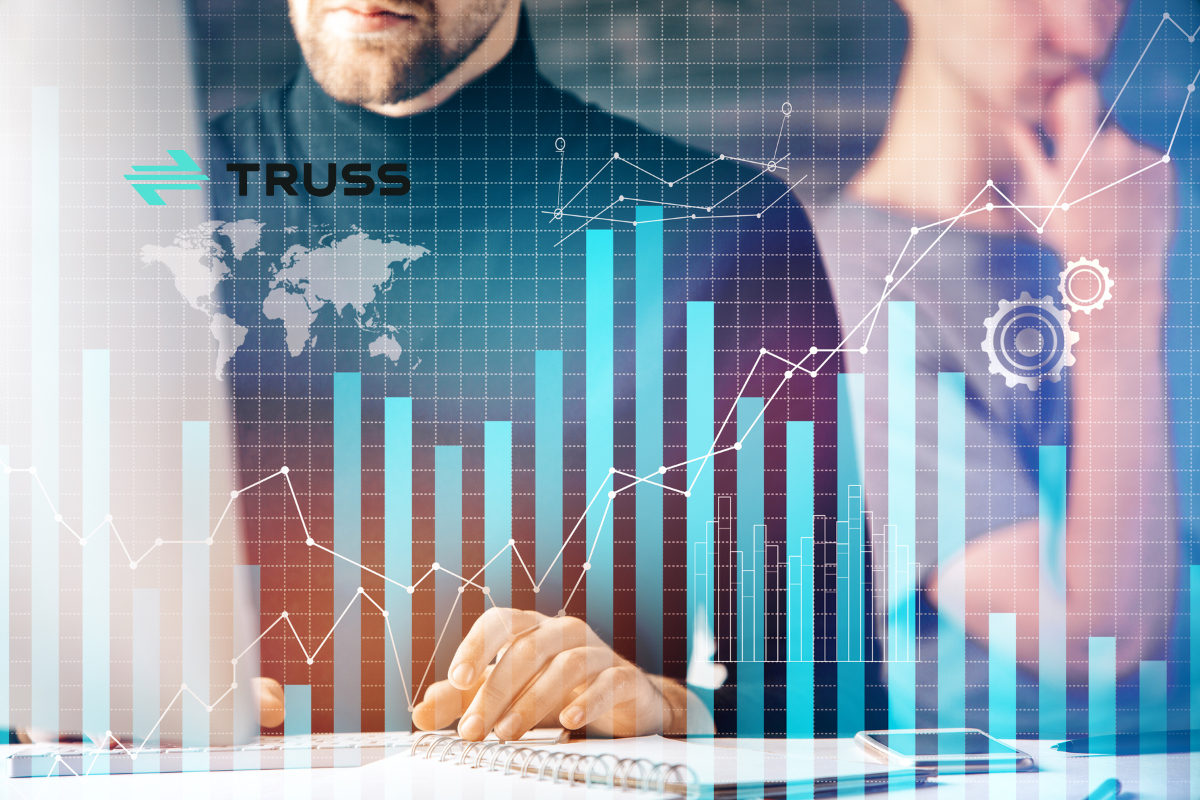 Construction business owners reviewing financial dashboards with growth charts and analytics overlay, symbolizing accounting efficiency with Թ.