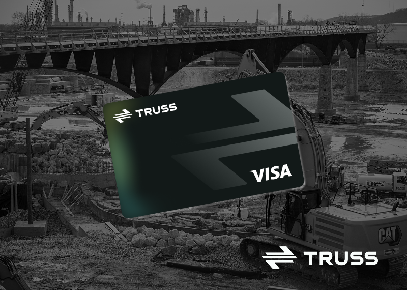 SAʴý VISA card displayed over a construction jobsite with heavy equipment and bridge framework in the background, representing instant settlement and seamless payment tools for contractors using SAʴý Payments.