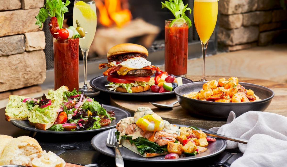 Four plates full of delicious brunch