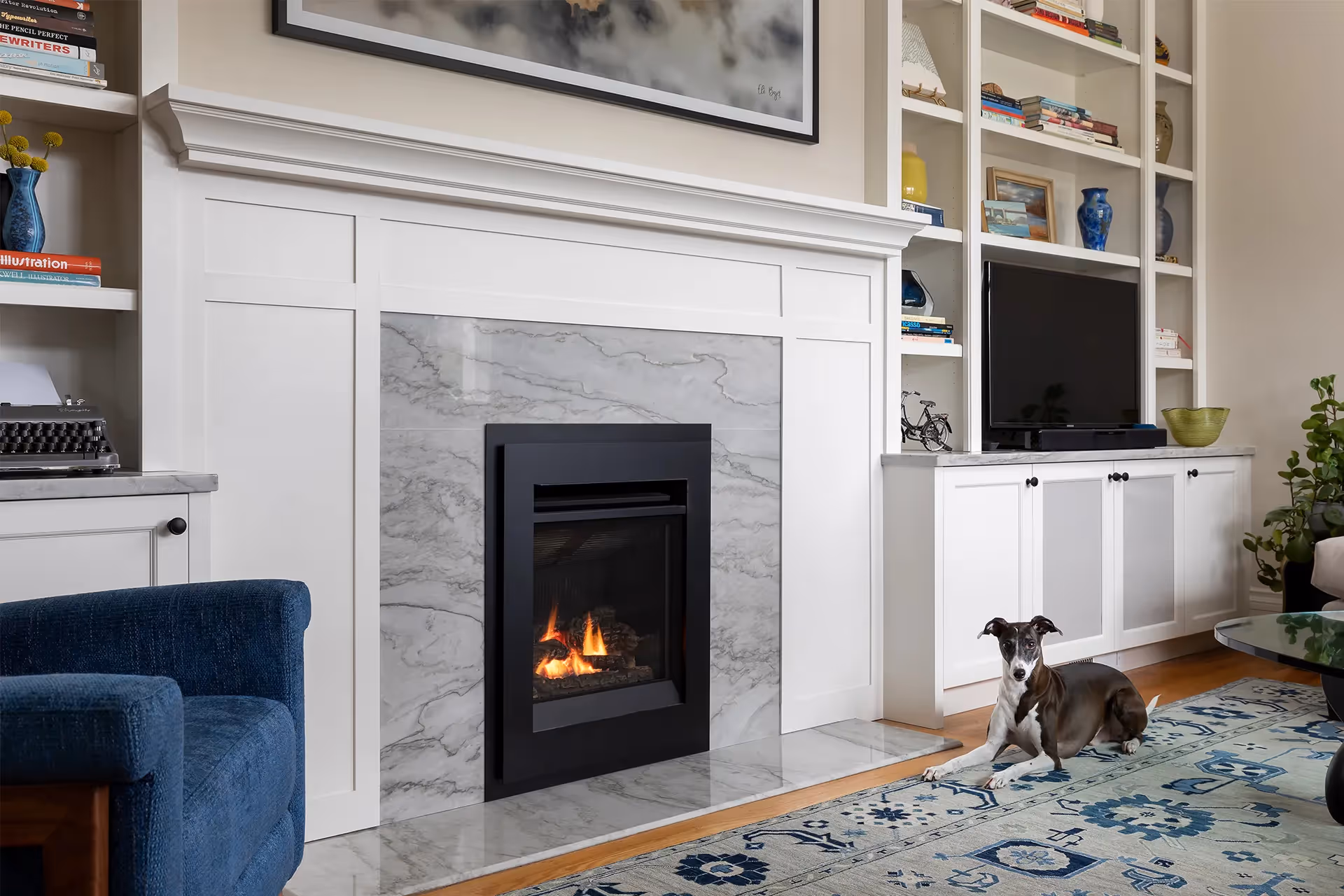 A 1920s craftsman restoration in Capitol Hill, Seattle — gas fireplace retrofit, quartzite surround, bold saturated textiles, and custom period built-ins.