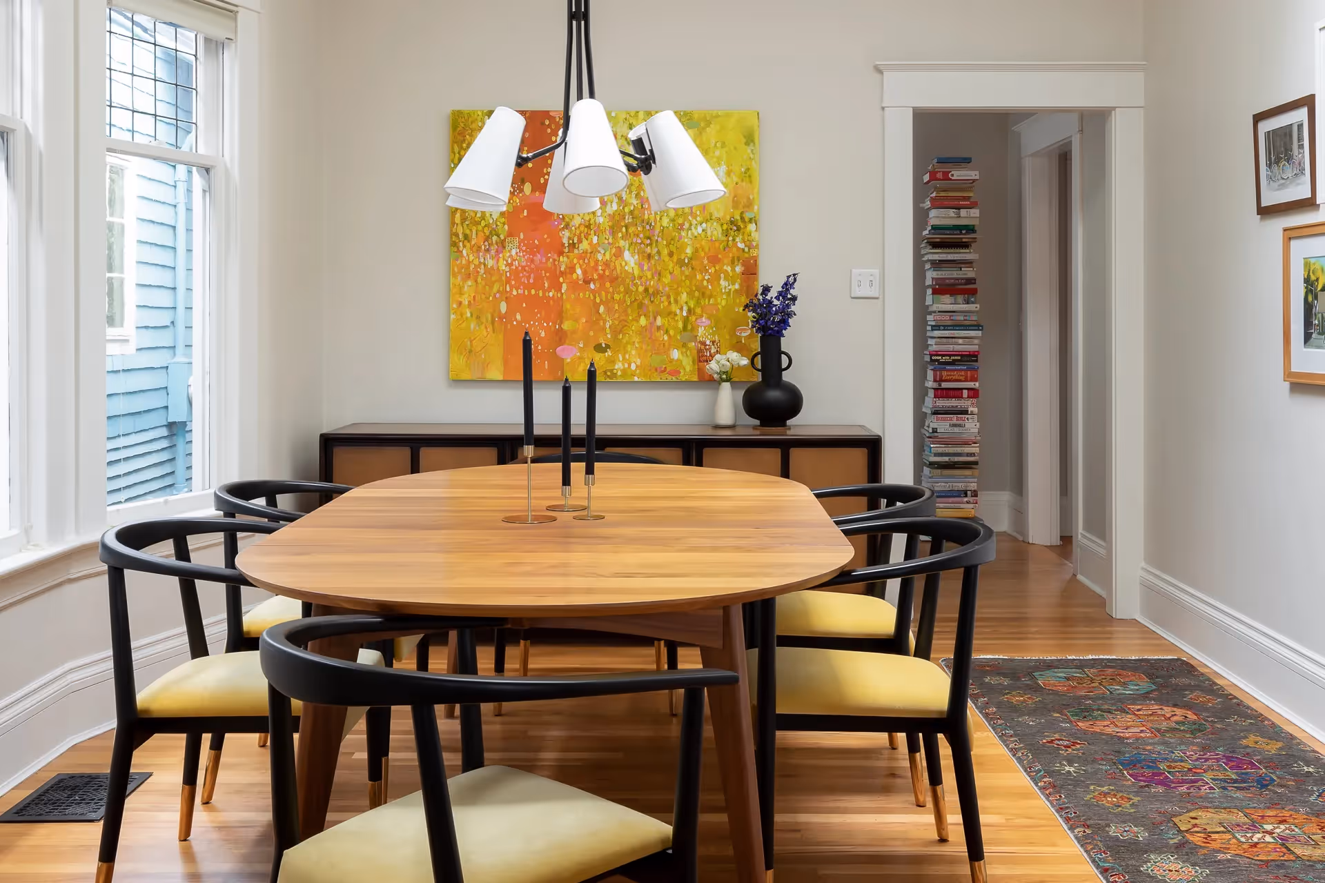 A 1920s craftsman restoration in Capitol Hill, Seattle — gas fireplace retrofit, quartzite surround, bold saturated textiles, and custom period built-ins.
