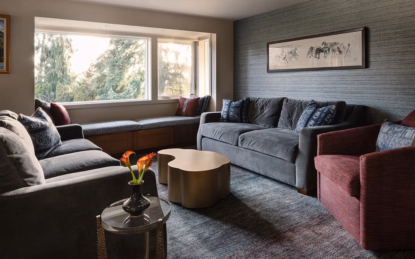 NKBA First Place winner for Open Plan Kitchen — a shimmering contemporary remodel in Bellevue featuring quartzite, African mahogany, and hidden appliances.