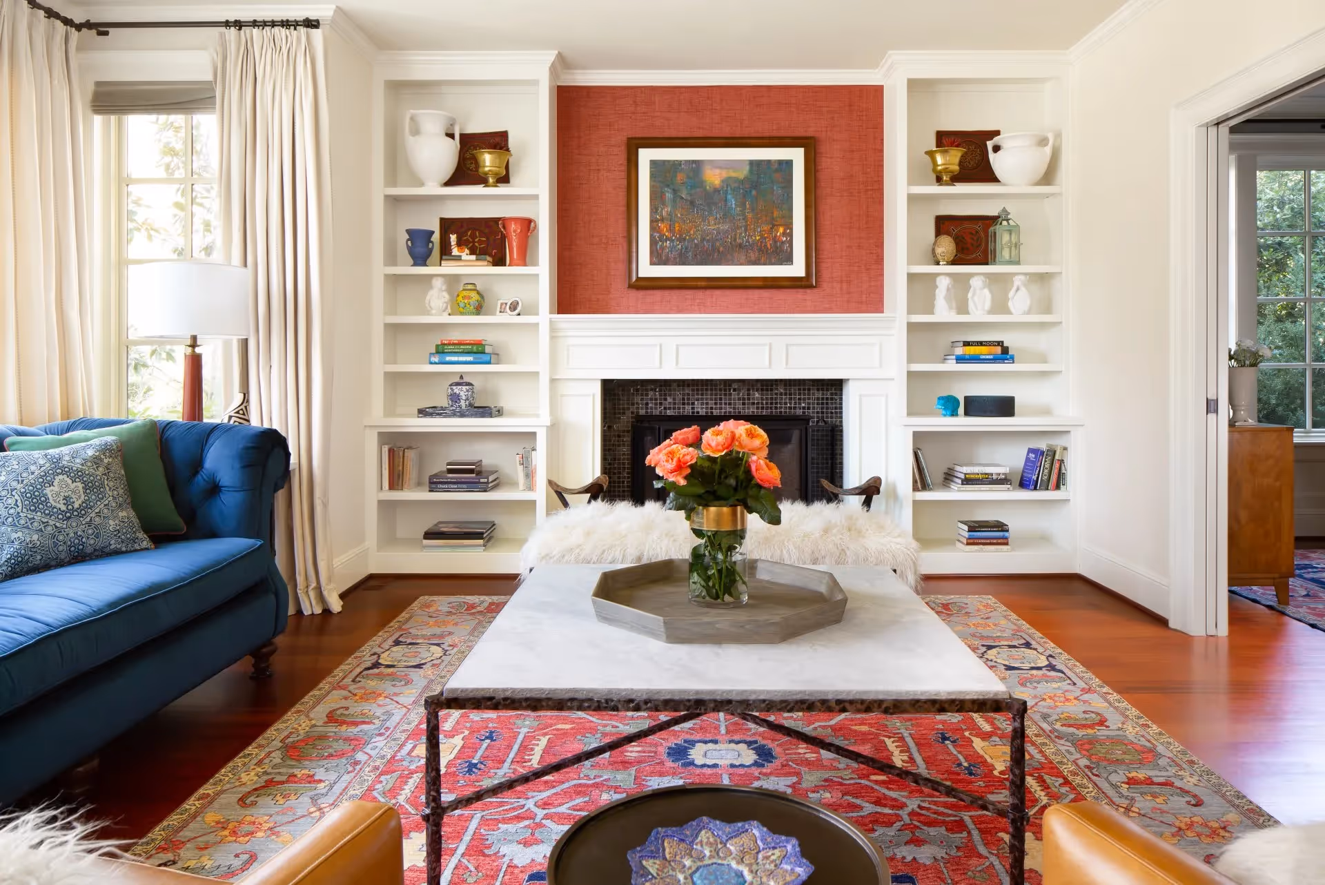 A gracious living and dining room for a Madison Park, Seattle home — vibrant color, old-world styling, and eclectic furnishings for a family of four.