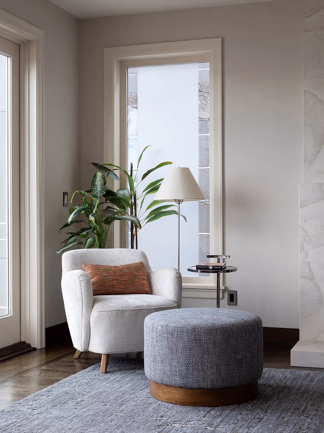 A serene living room, bedroom, and library refresh in Seattle's Madrona neighborhood — water-inspired palette, custom fiber art, and bespoke furnishings.