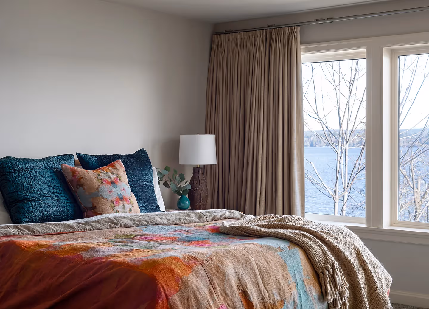 A serene living room, bedroom, and library refresh in Seattle's Madrona neighborhood — water-inspired palette, custom fiber art, and bespoke furnishings.