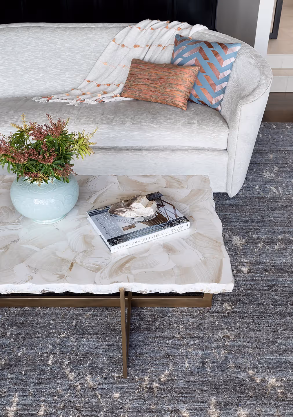A serene living room, bedroom, and library refresh in Seattle's Madrona neighborhood — water-inspired palette, custom fiber art, and bespoke furnishings.