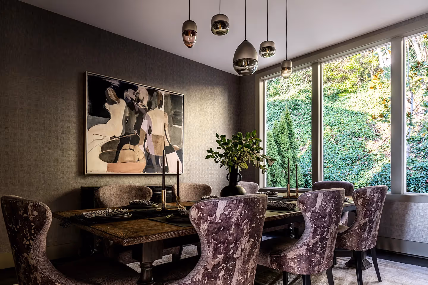 A whole-home transformation in Seattle's Magnolia neighborhood — living room, kitchen, deck, and dining room with sweeping water views and local art.