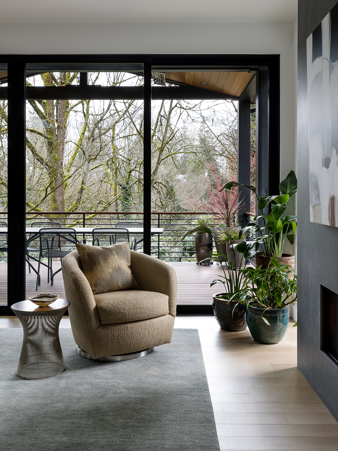 A Zen-inspired full remodel of a mid-century modern home in North Seattle — bookmatched cabinetry, quartzite countertops, and custom furnishings.