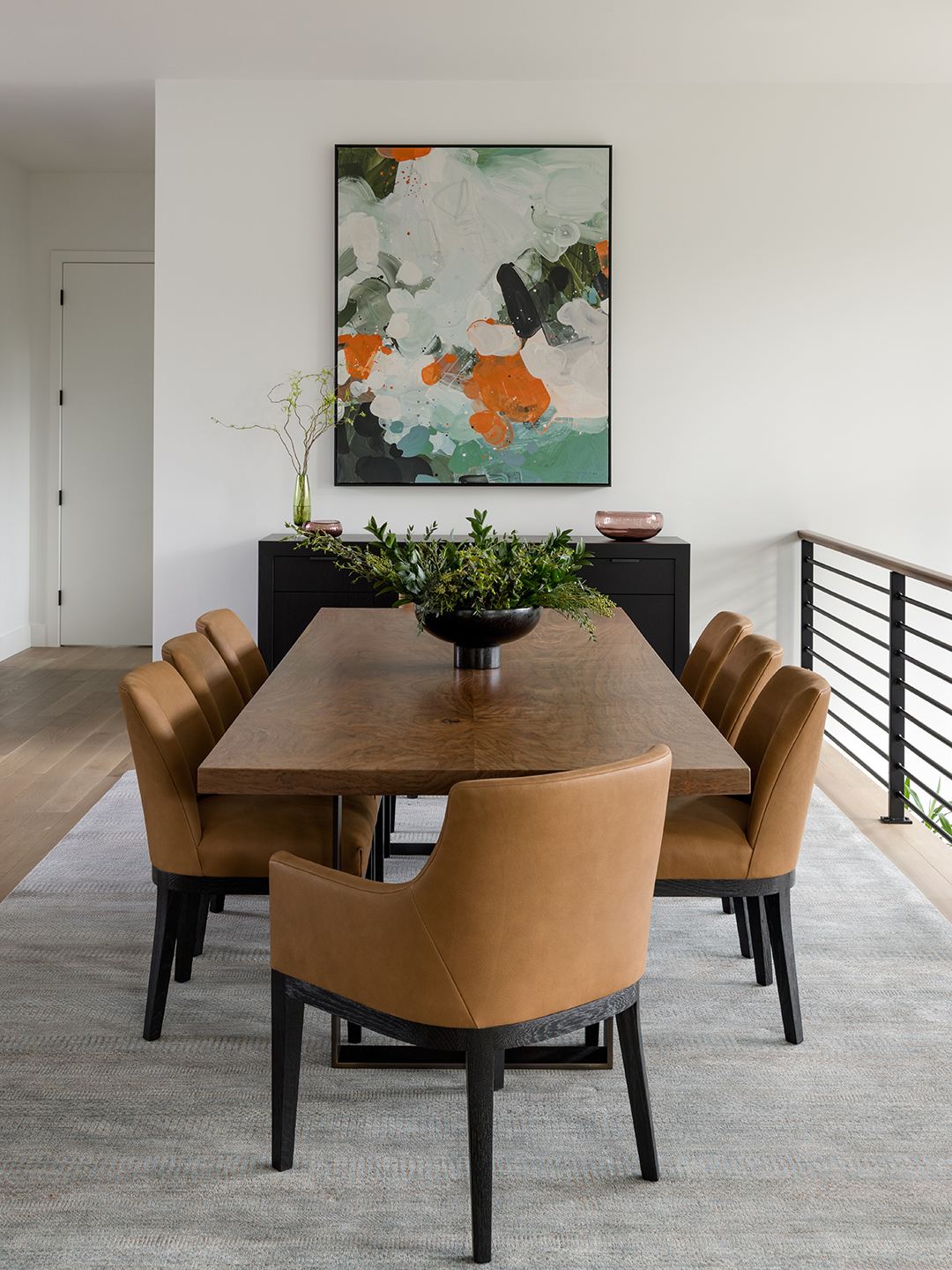 A Zen-inspired full remodel of a mid-century modern home in North Seattle — bookmatched cabinetry, quartzite countertops, and custom furnishings.