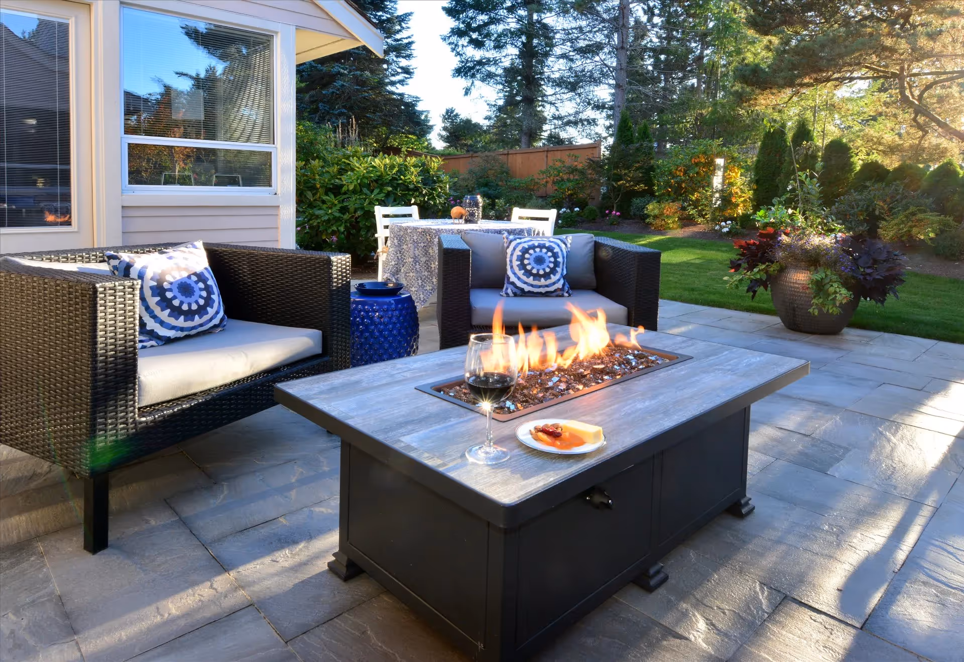 A Remodeling Excellence Award-winning kitchen and family room remodel in Mill Creek — open floorplan, wine storage, and a custom waterfall quartz table.