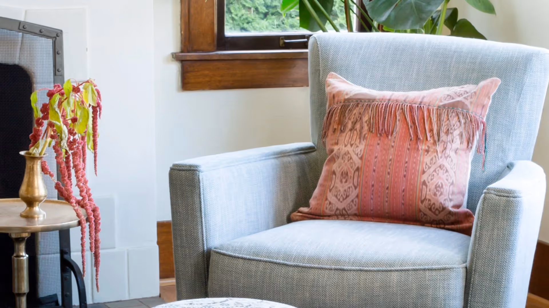 A whole-home update for a Seattle bungalow in Phinney Ridge — blue-toned palette, vintage antiques, custom furnishings, and family-friendly design.