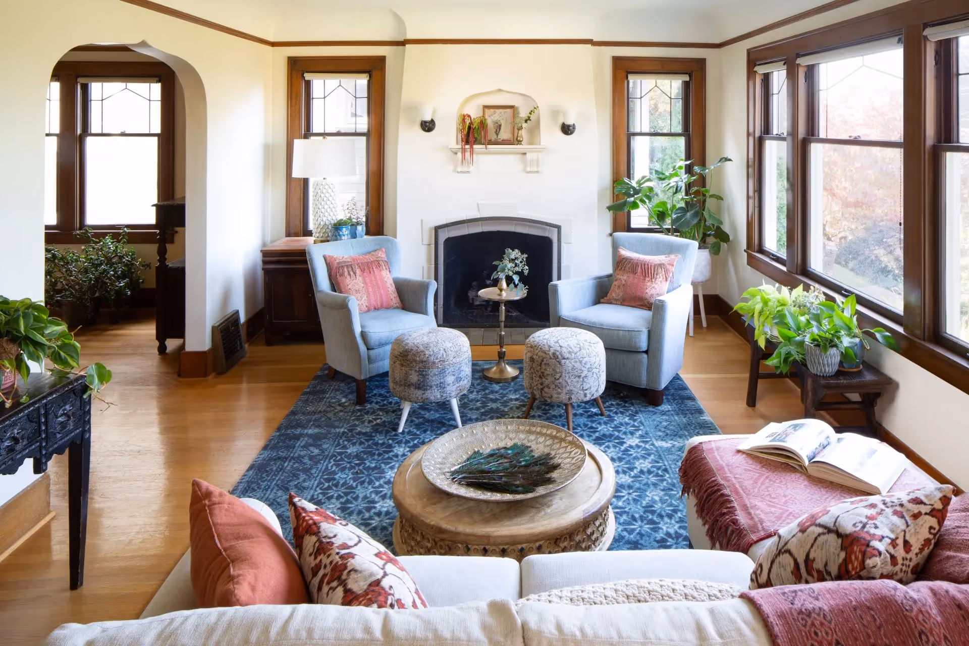 A whole-home update for a Seattle bungalow in Phinney Ridge — blue-toned palette, vintage antiques, custom furnishings, and family-friendly design.