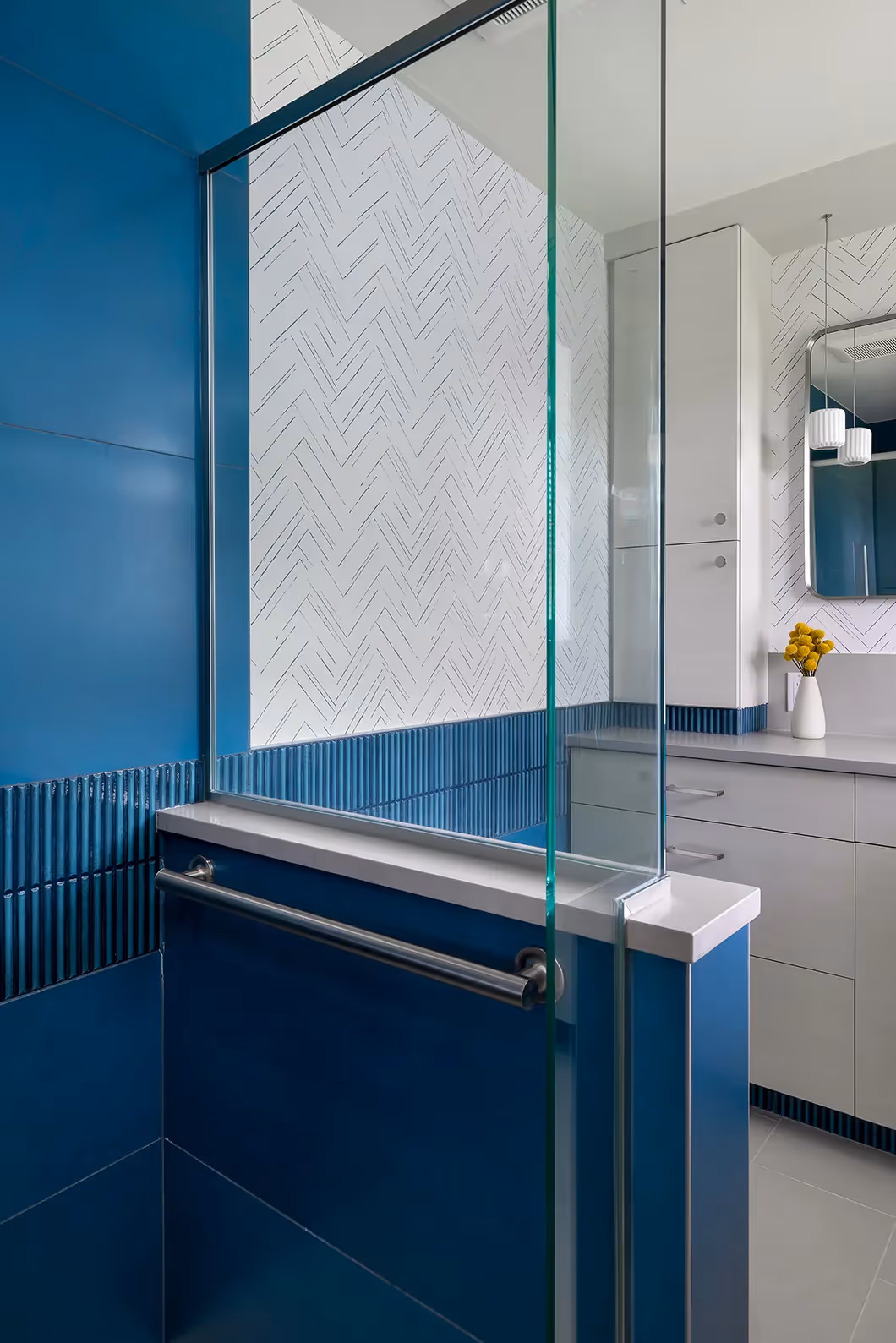An award-winning guest bath in Sunset Hill, Seattle — ripple tile, vibrant wallcovering, and an NKBA 2023 Third Place recognition.