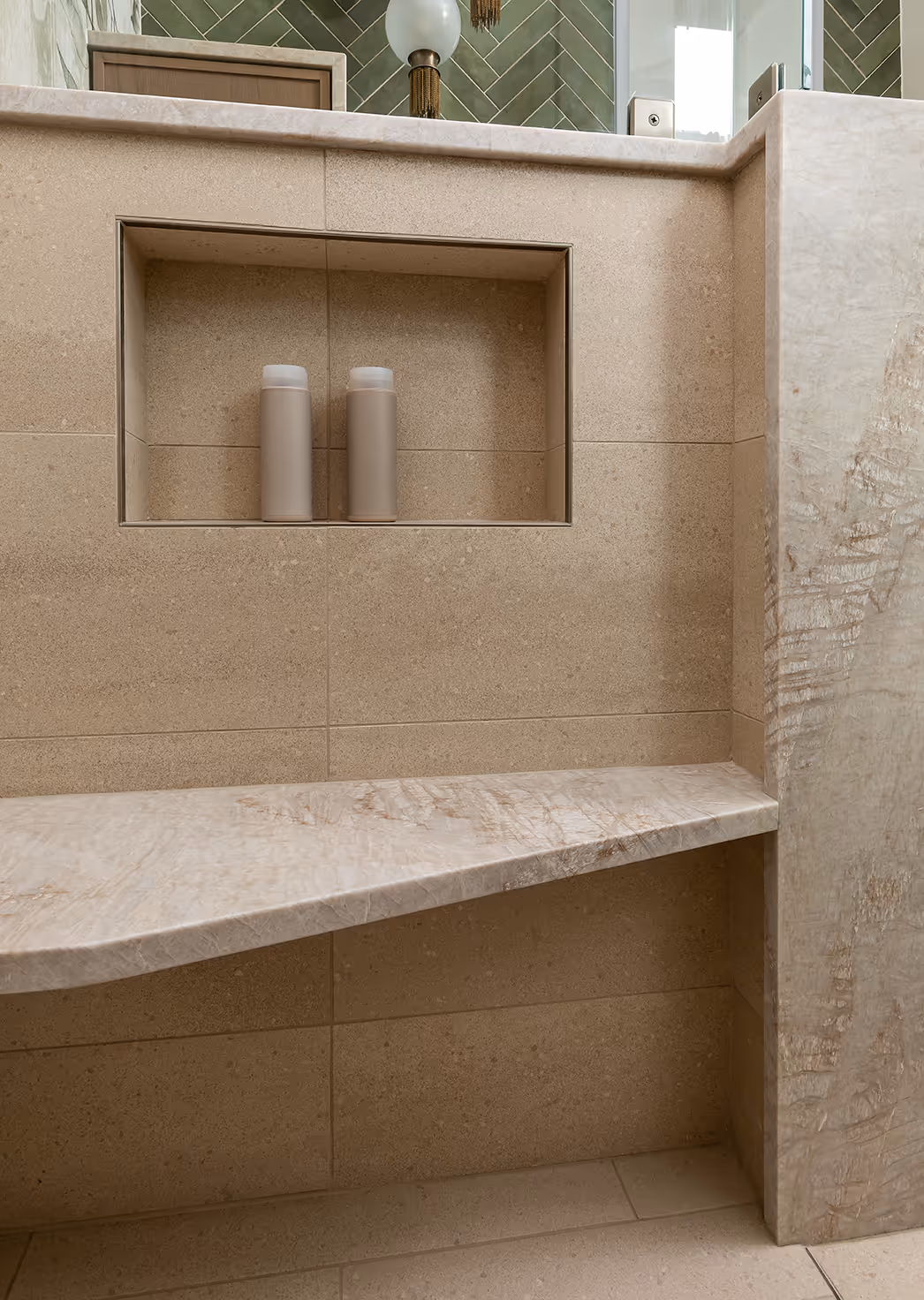 A down-to-studs guest bath remodel in Seattle's Central District — botanical mural, quartzite slab, and herringbone tile in a 1920s craftsman.