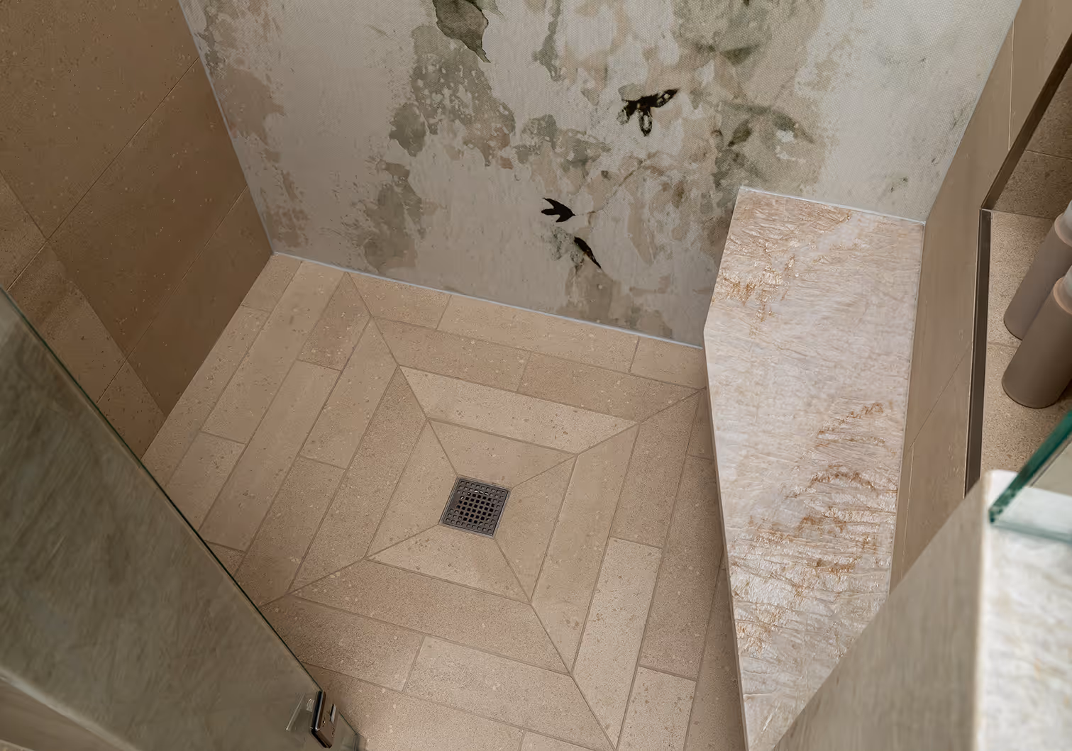 A down-to-studs guest bath remodel in Seattle's Central District — botanical mural, quartzite slab, and herringbone tile in a 1920s craftsman.