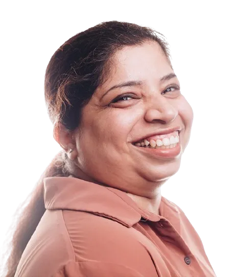 Smiling woman with dark hair tied back, wearing a brown collared shirt.