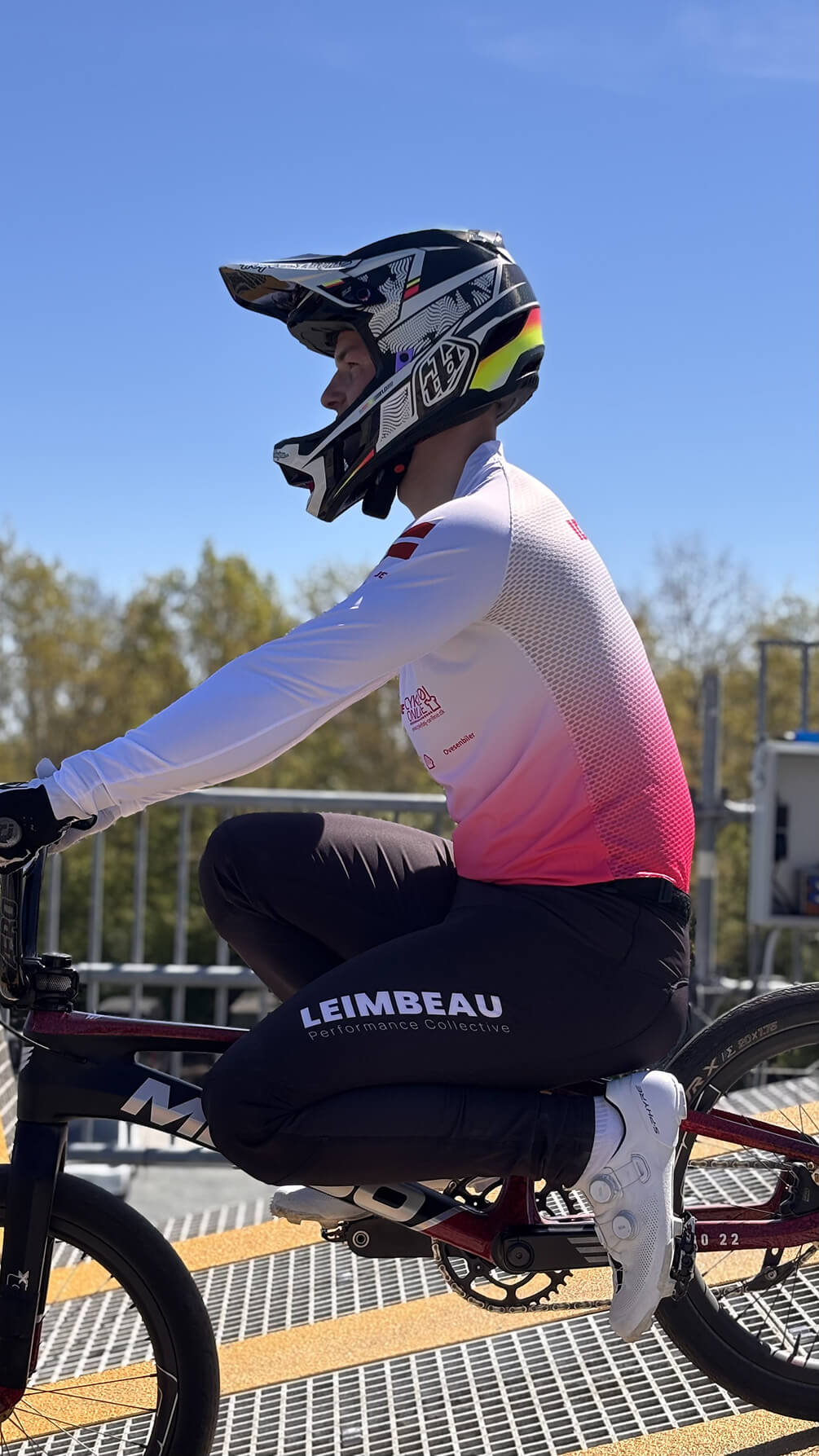 BMX rider in pink Leimbeau custom jeresy