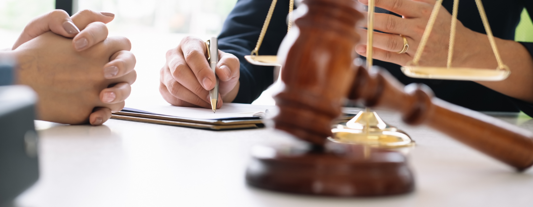 Wadsworth criminal defense lawyer discussing legal defense options with a client during a criminal case consultation in Ohio.