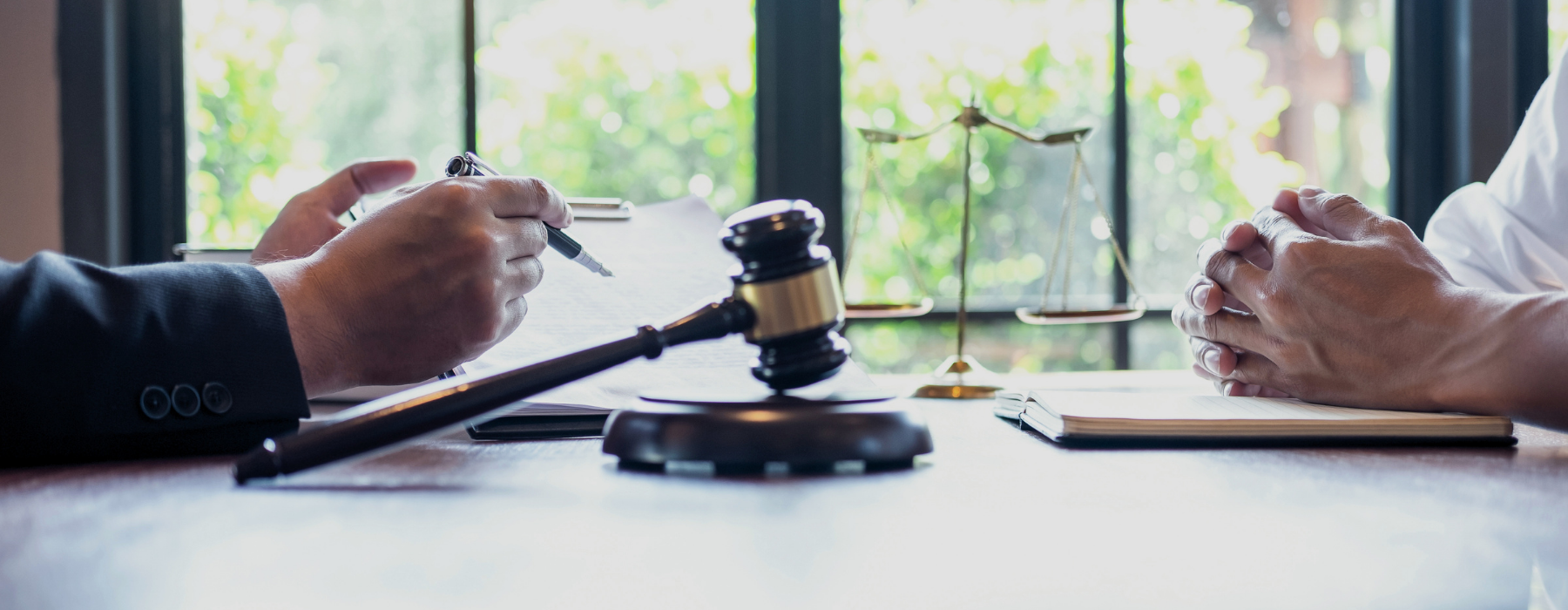 Sandusky criminal defense lawyer providing legal counsel during a criminal defense consultation with a client in Ohio.
