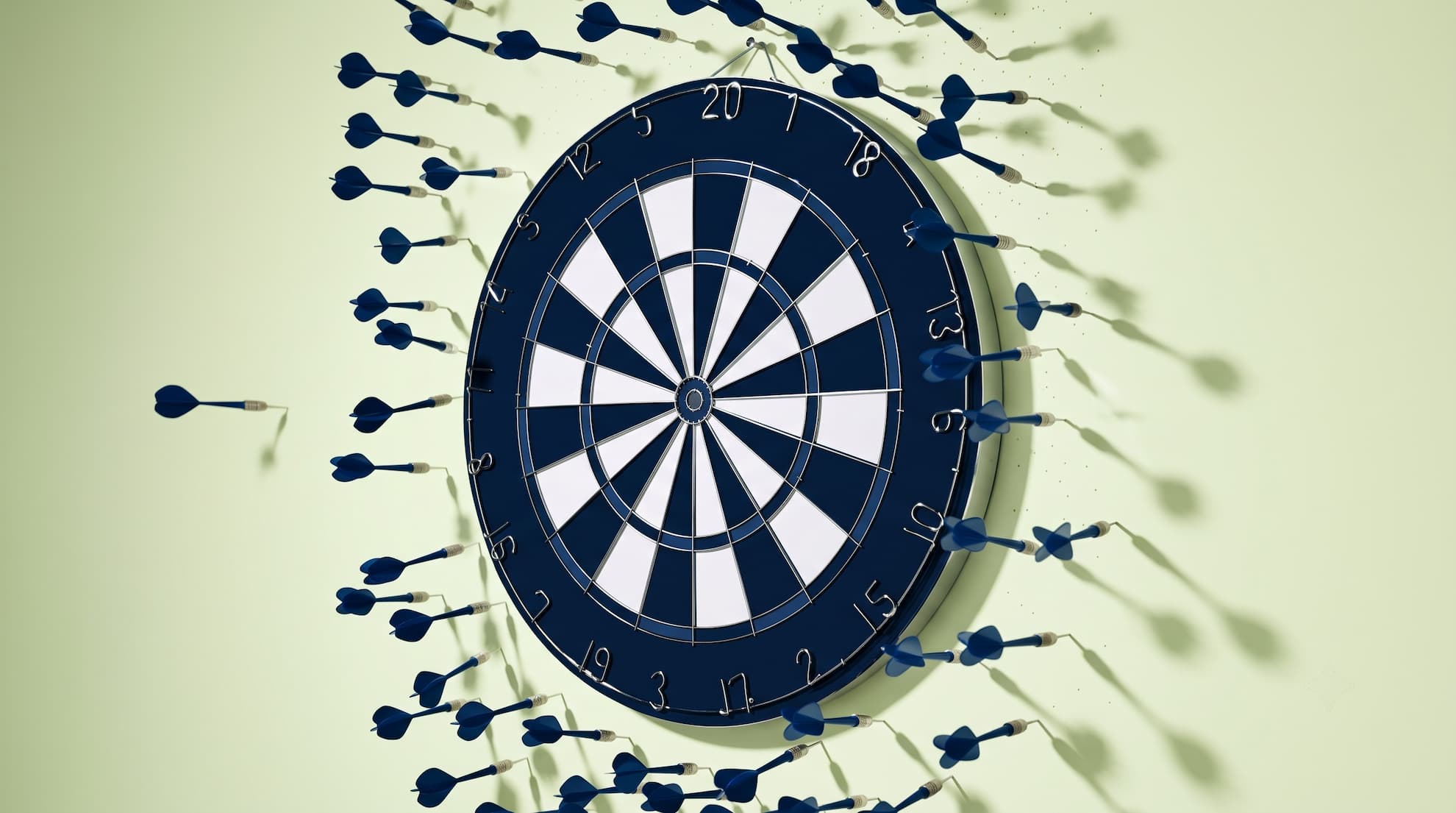 Darts missing a dartboard, illustrating a missed completion date