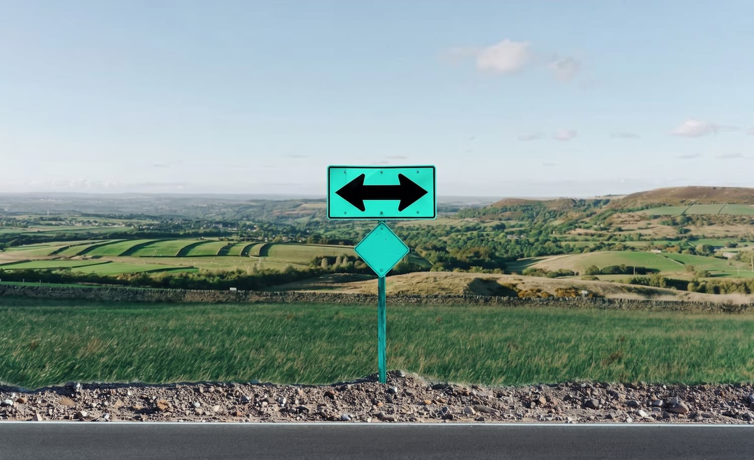 Two-way arrow sign symbolising limited company vs personal buy-to-let
