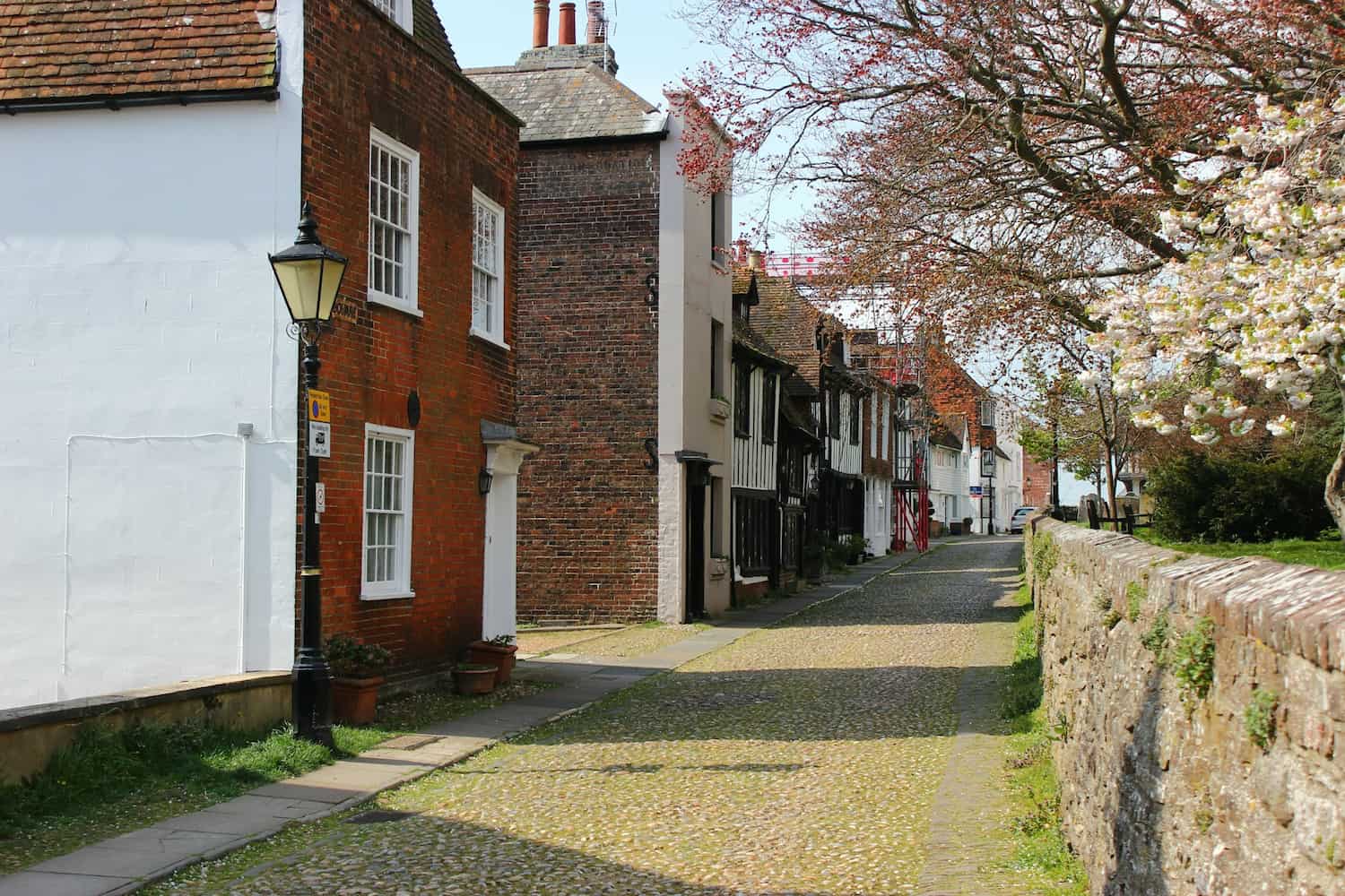 Cobbled street of older UK terraced houses, the kind of unmodernised stock often bought as a probate property
