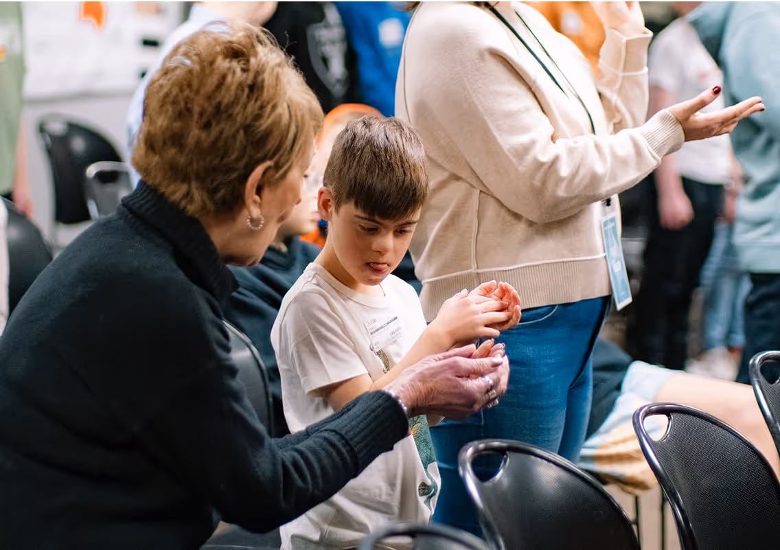 an adult with a child with a disability