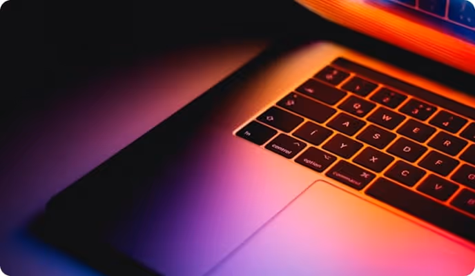 A glowing laptop screen.