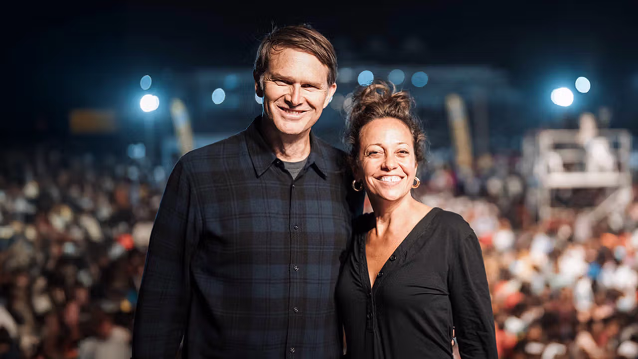 Andrew and Wendy Palau on a stage together