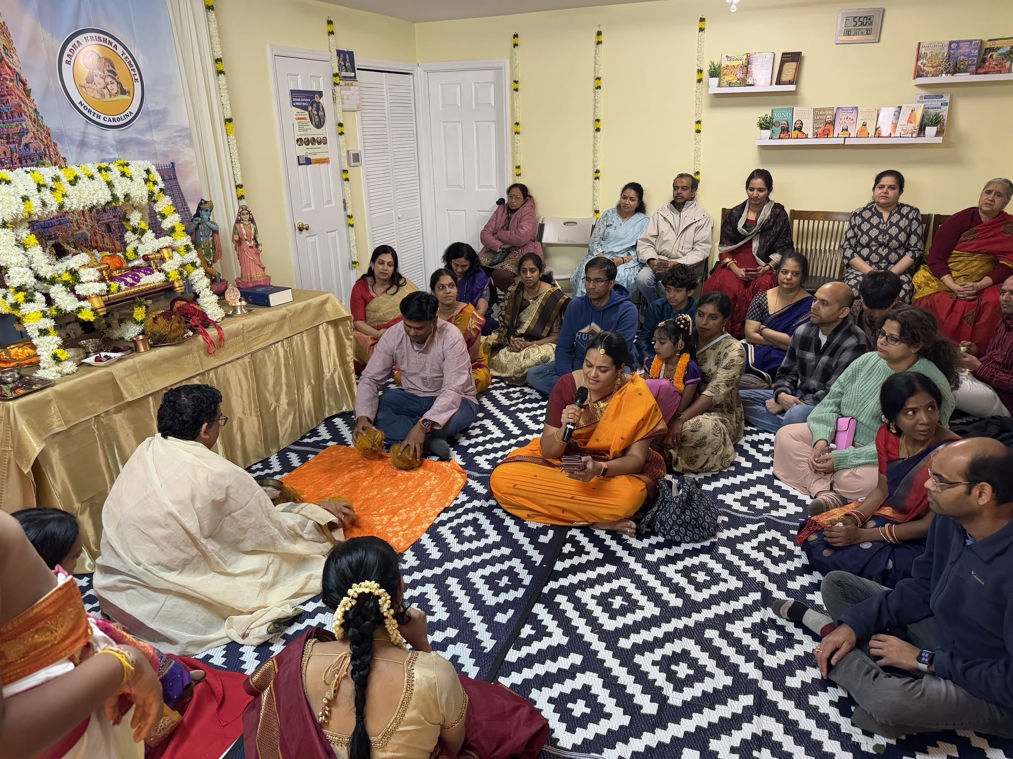 Devotees chanting together during Sunday Satsang at Radha Krishna Temple of North Carolina