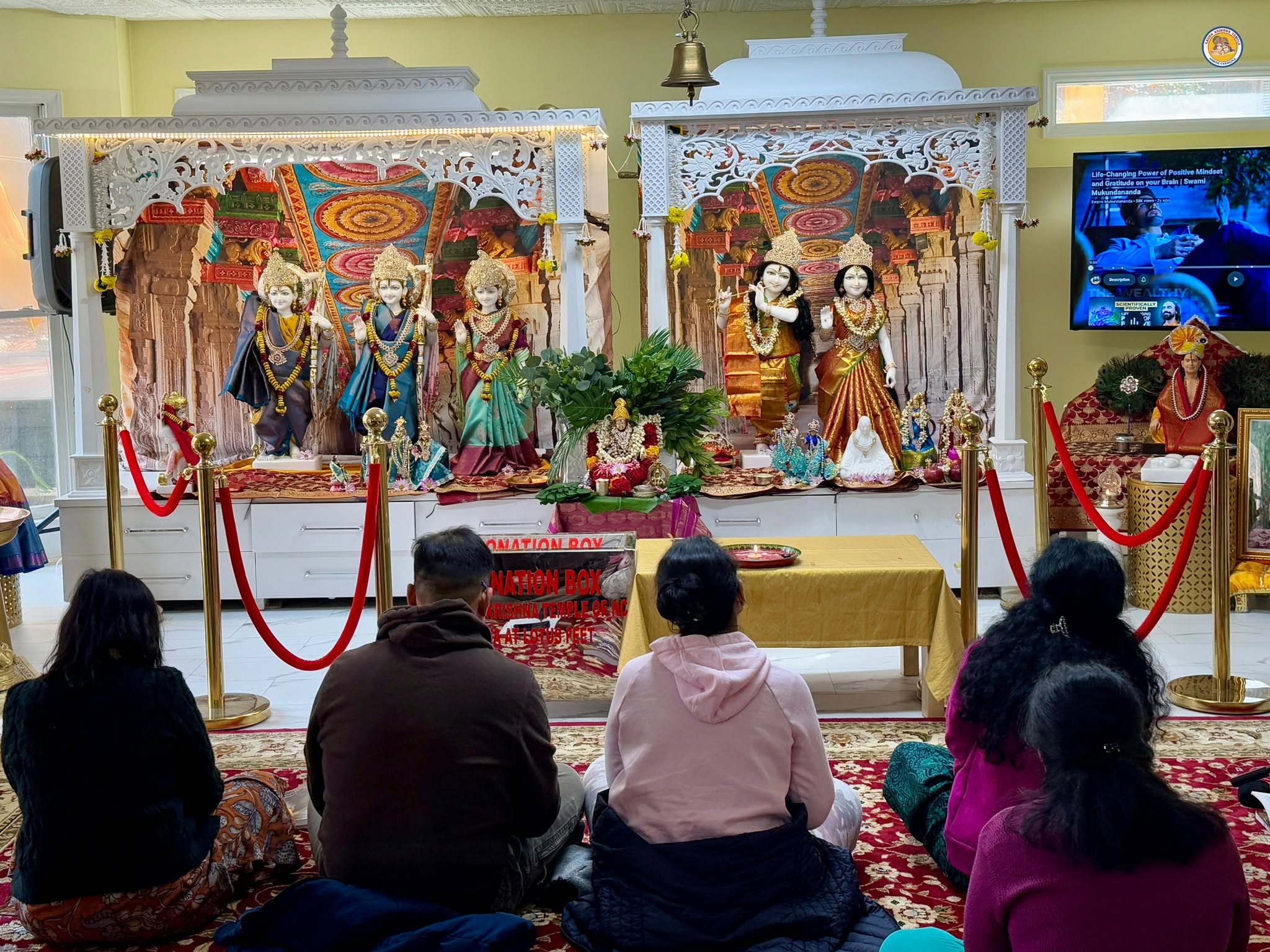 Gita discourse being given at the temple