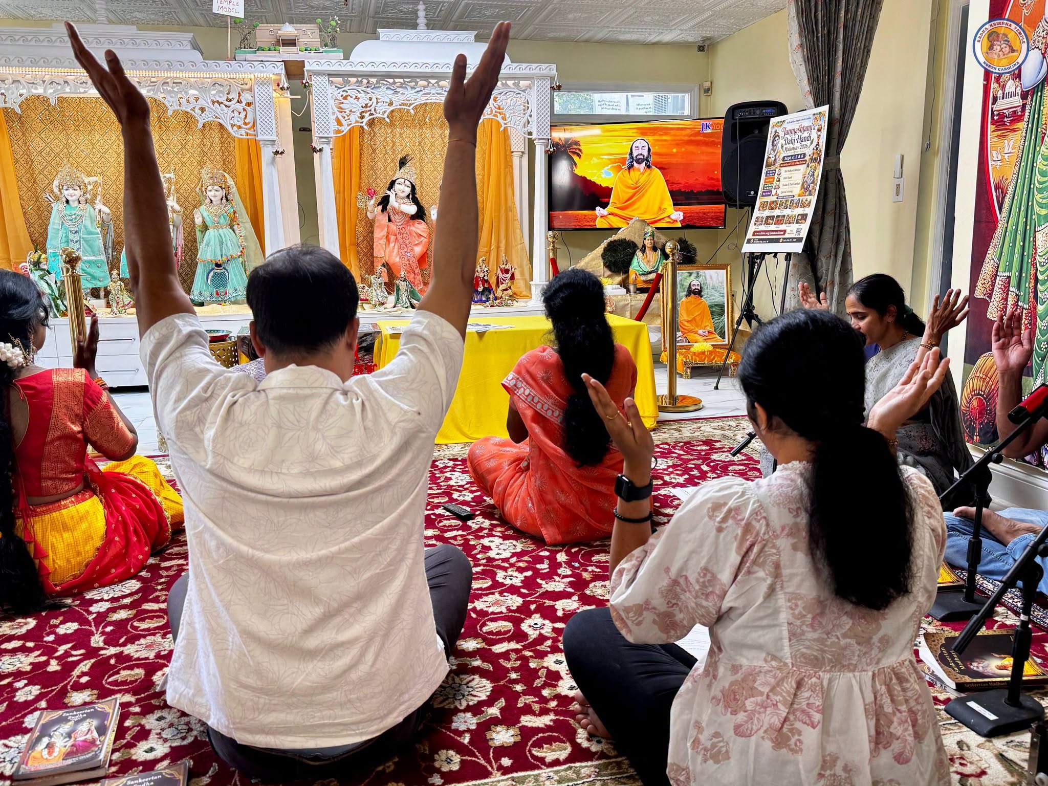Devotees in guided meditation