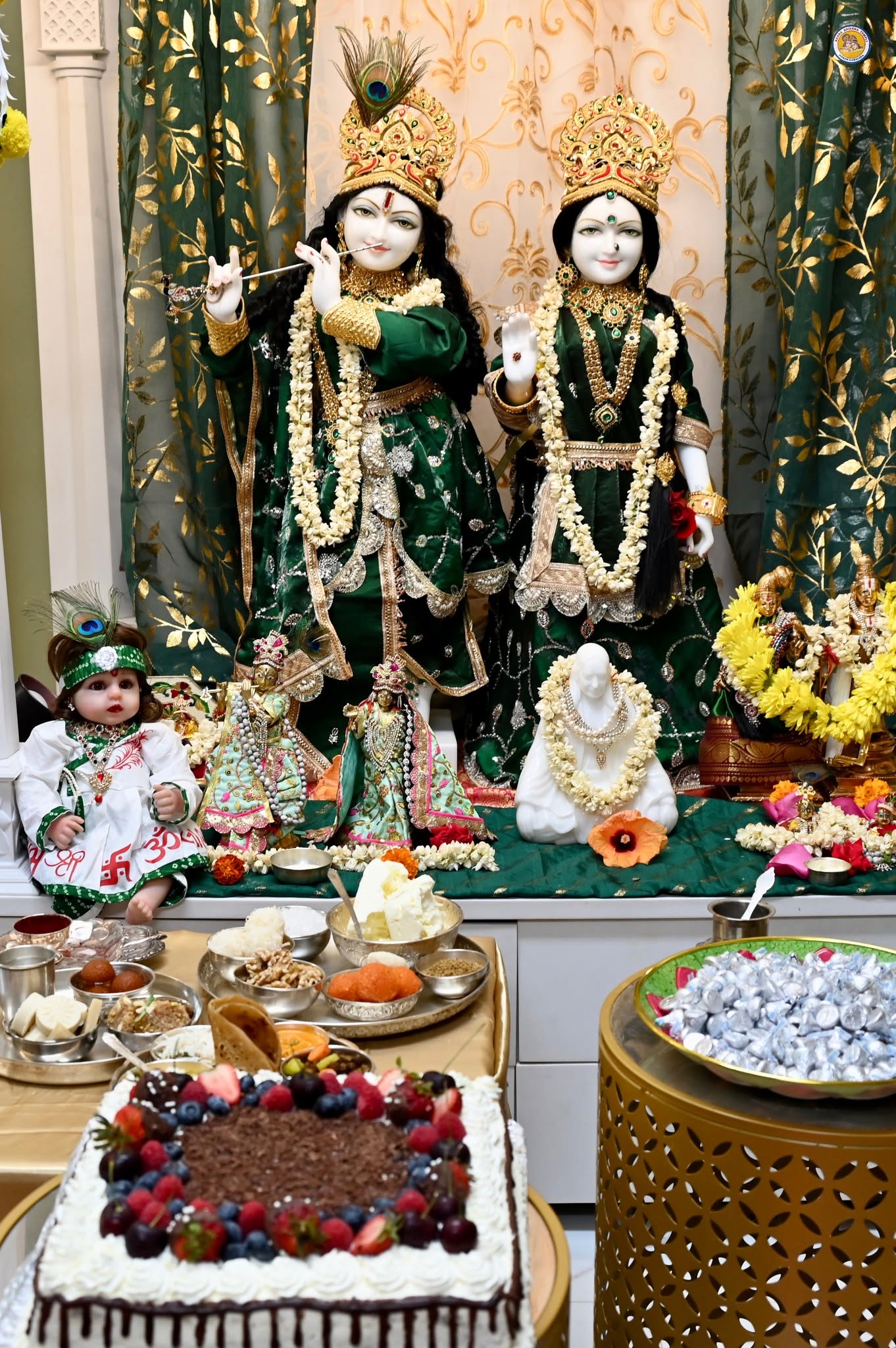 Temple devotees in prayer during satsang