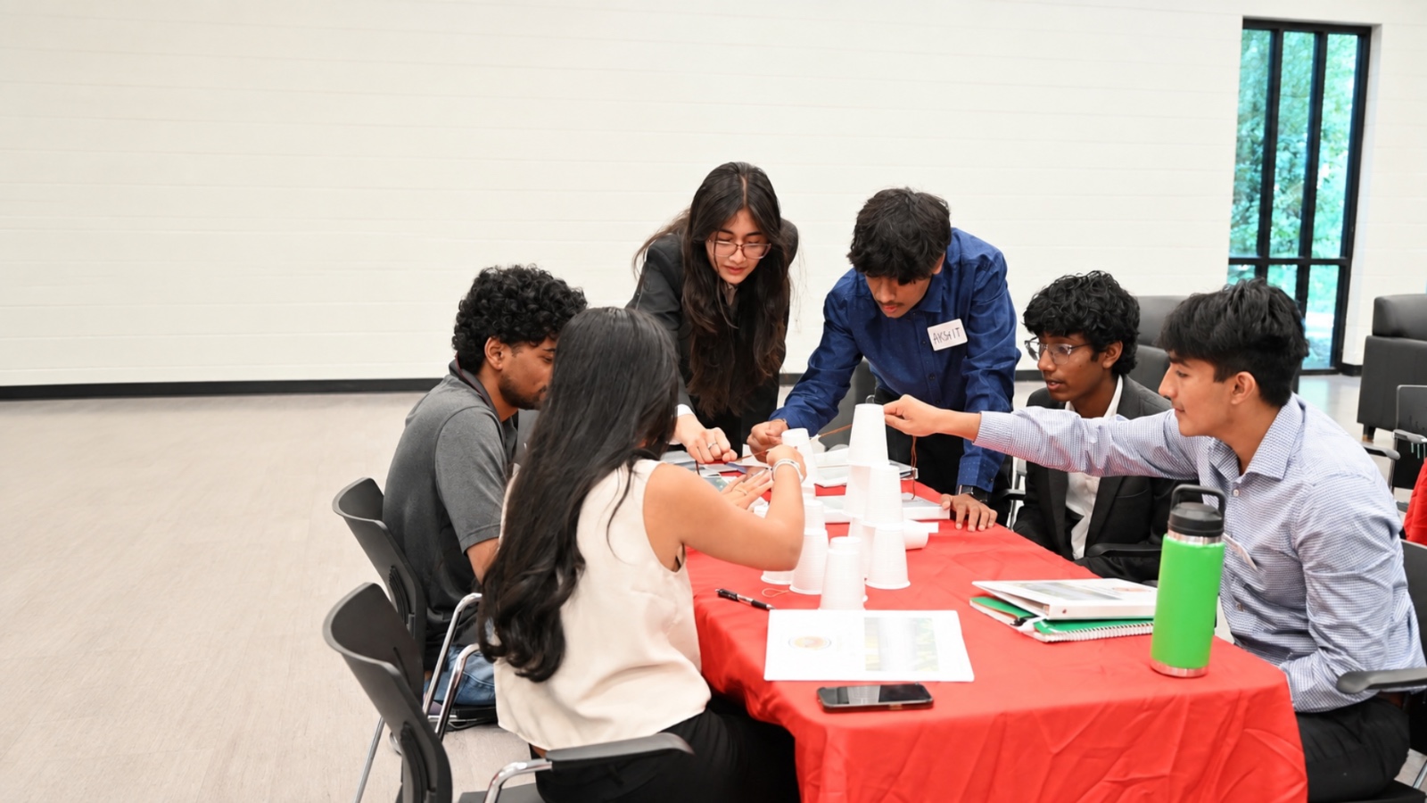 Youth participants collaborating during a past Youth Leadership Workshop session