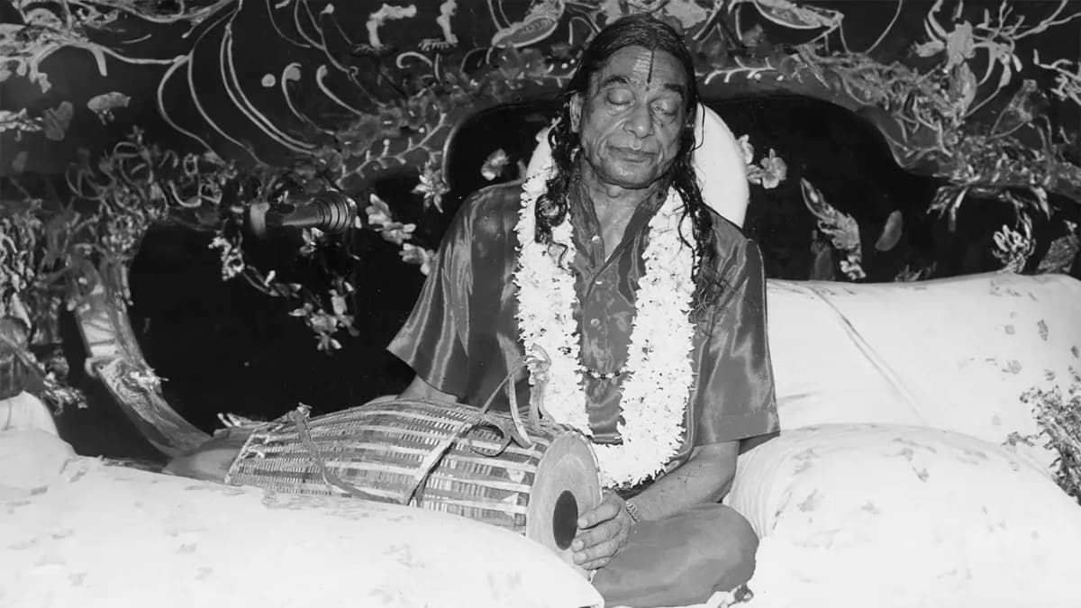Shree Maharajji absorbed in divine love